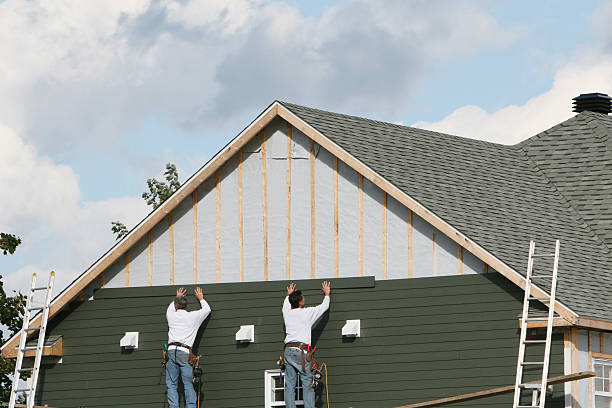 Professional Siding technician working in Perrysville, OH